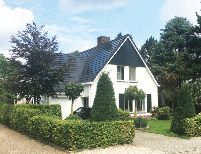 Crest Solinso solar tiles to white house Crest Solinso solar tiles to white house